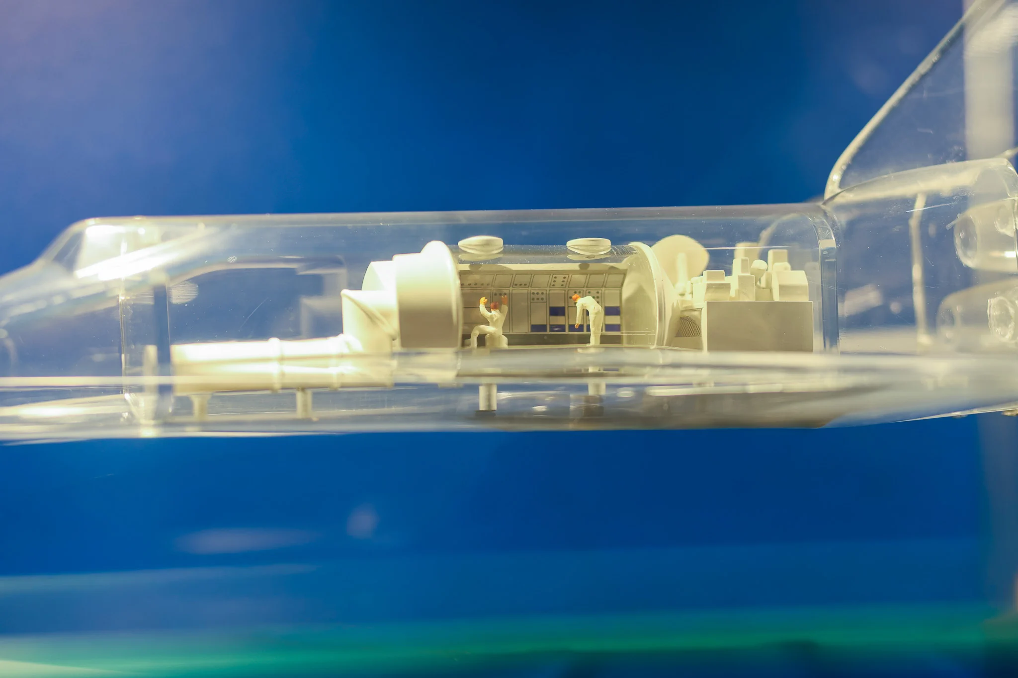 Transparent model of a NASA Space Shuttle revealing the Spacelab laboratory installed inside its payload bay